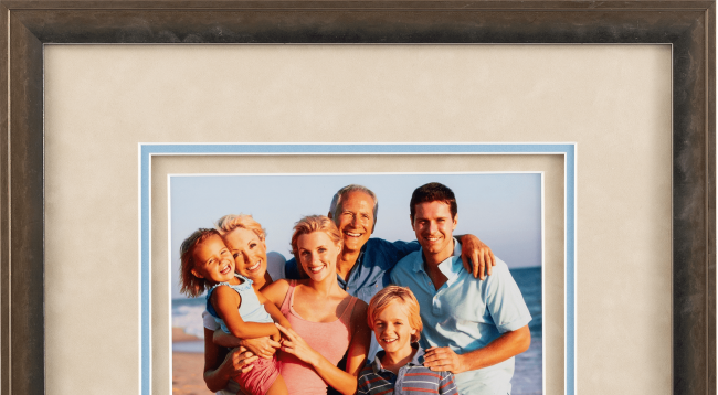 photo of family on beach with seashells