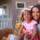 Picture of woman with beautiful kids that was edited to look more like a painting.