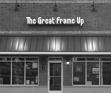 The Great Frame Up storefront with awning.