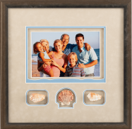 family on beach with seashells