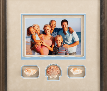 family on beach with seashells