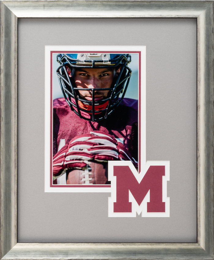 framed football picture and letter