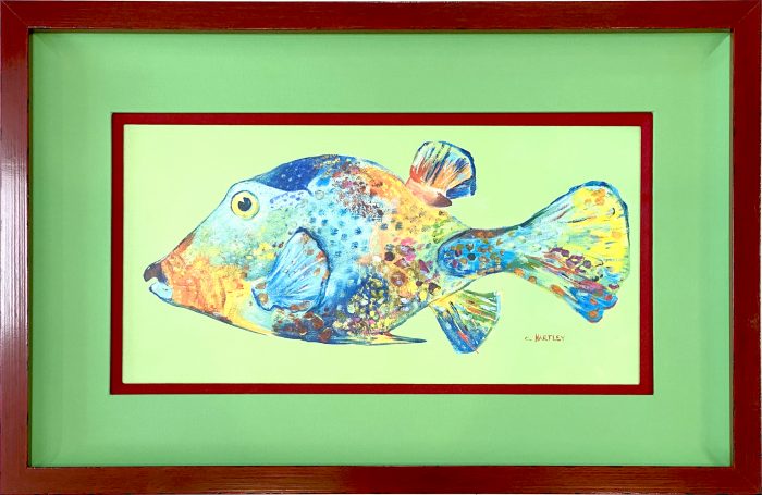 green fabric mat on framed fish